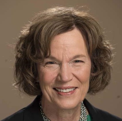 woman with brown hair smiling