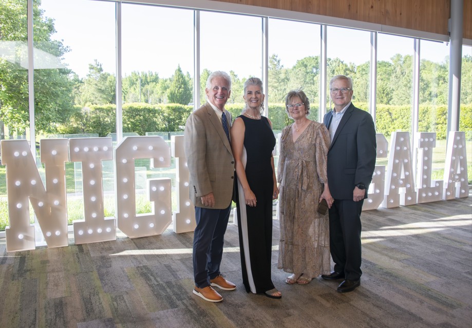 People standing in a reception hall